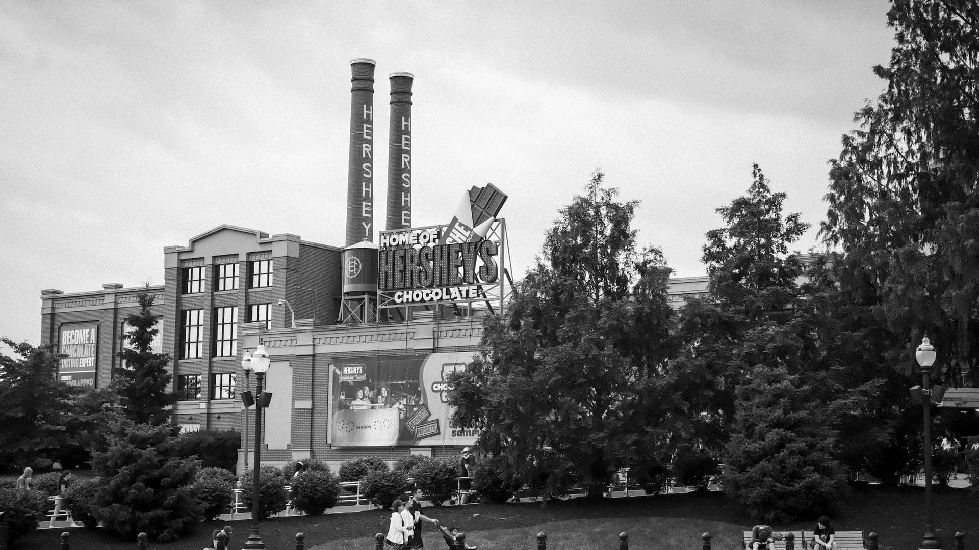 The old Hershey chocolate factory and its smokestacks in Hershey, Pennsylvania, in black and white
